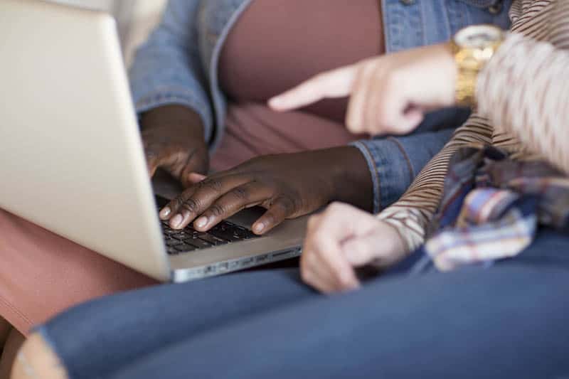 Christian woman sharing our free online Bible study resources | Double your impact this giving season